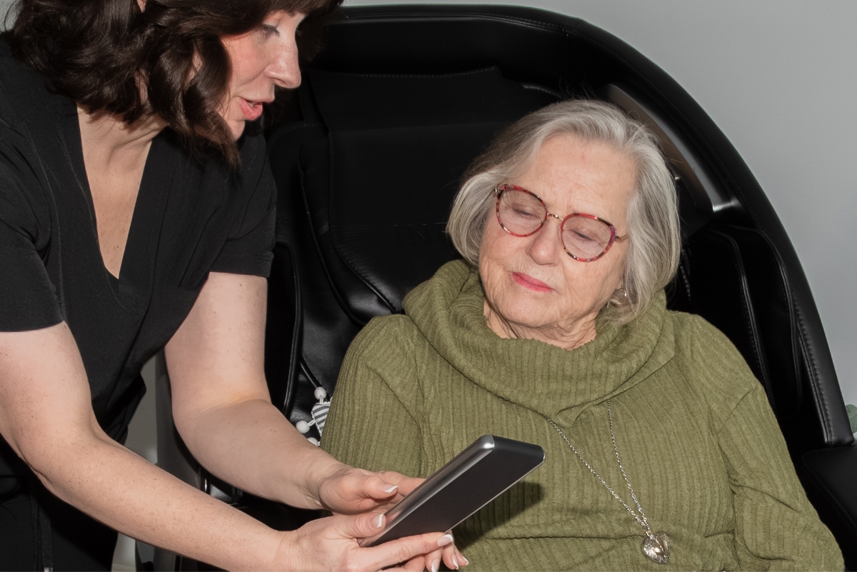 Patient and technician discussing treatment